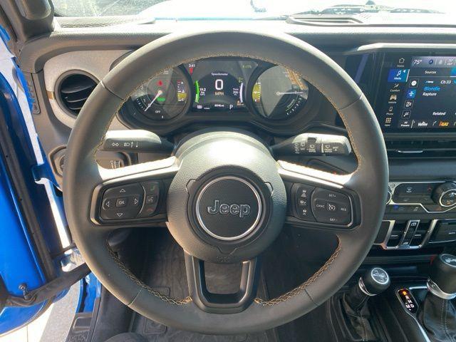 used 2024 Jeep Wrangler 4xe car, priced at $31,299