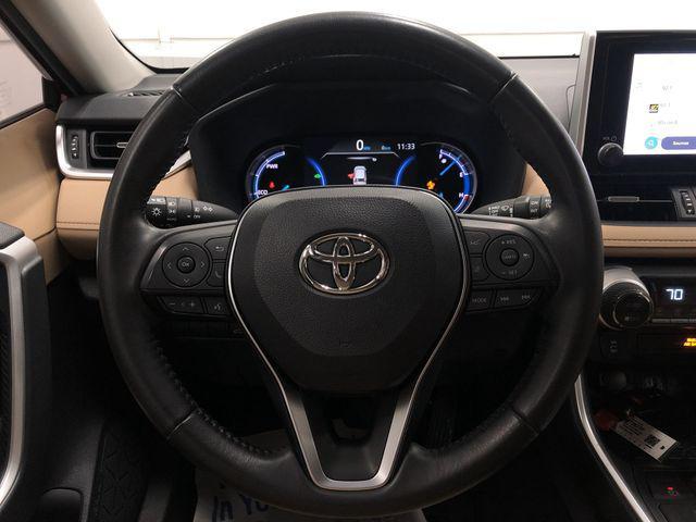 used 2023 Toyota RAV4 Hybrid car, priced at $34,199