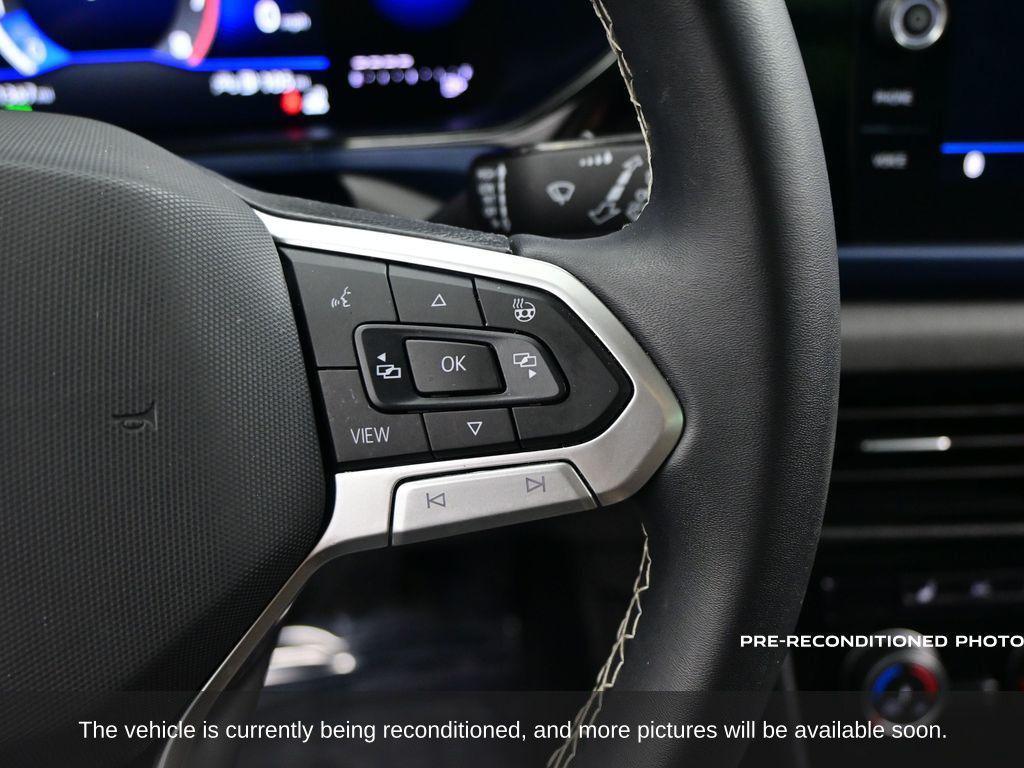used 2023 Volkswagen Taos car, priced at $17,799