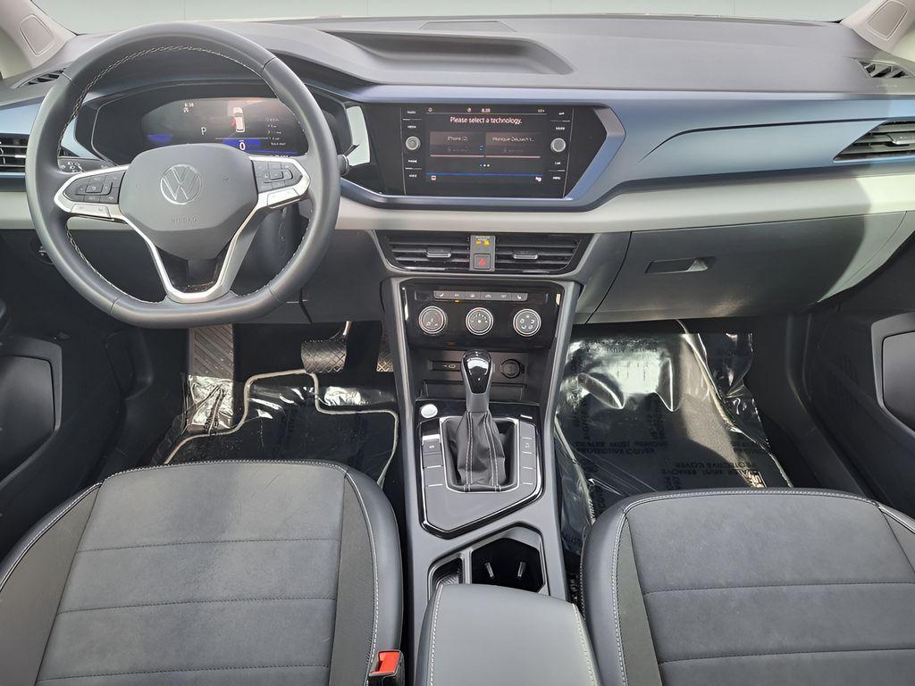 used 2023 Volkswagen Taos car, priced at $18,300