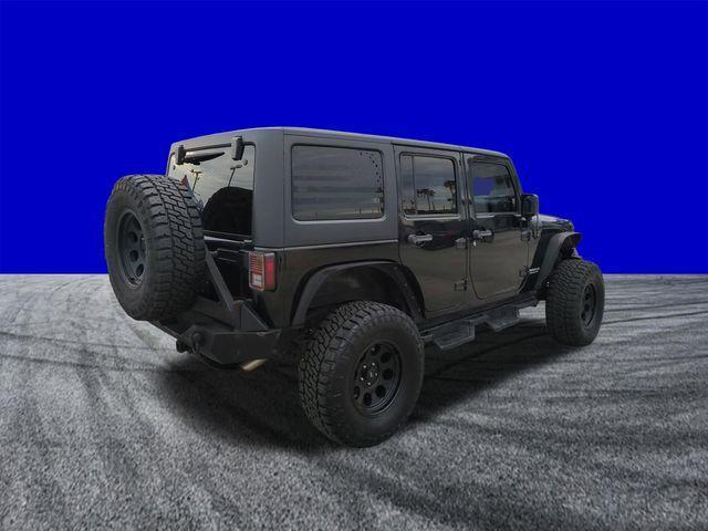 used 2012 Jeep Wrangler Unlimited car, priced at $15,998
