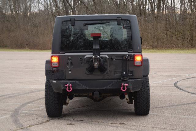 used 2014 Jeep Wrangler Unlimited car, priced at $9,000