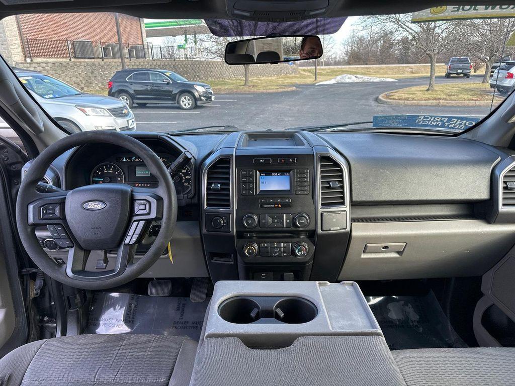 used 2018 Ford F-150 car, priced at $15,500