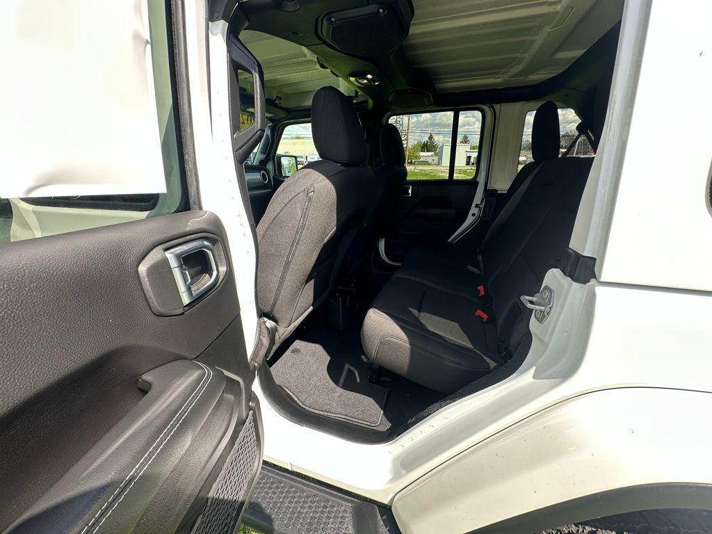 used 2023 Jeep Wrangler car, priced at $32,192