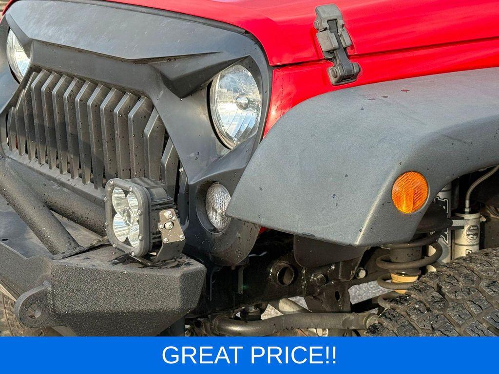 used 2018 Jeep Wrangler JK Unlimited car, priced at $21,999