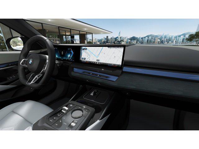 new 2026 BMW 550e car, priced at $88,885