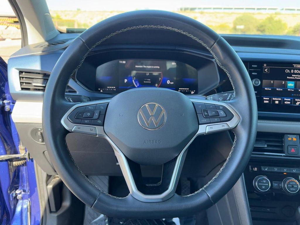 used 2024 Volkswagen Taos car, priced at $16,784