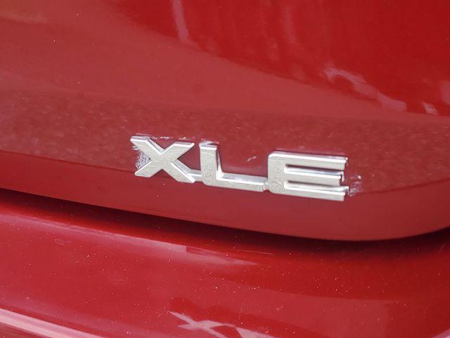 used 2021 Toyota Highlander Hybrid car, priced at $27,436