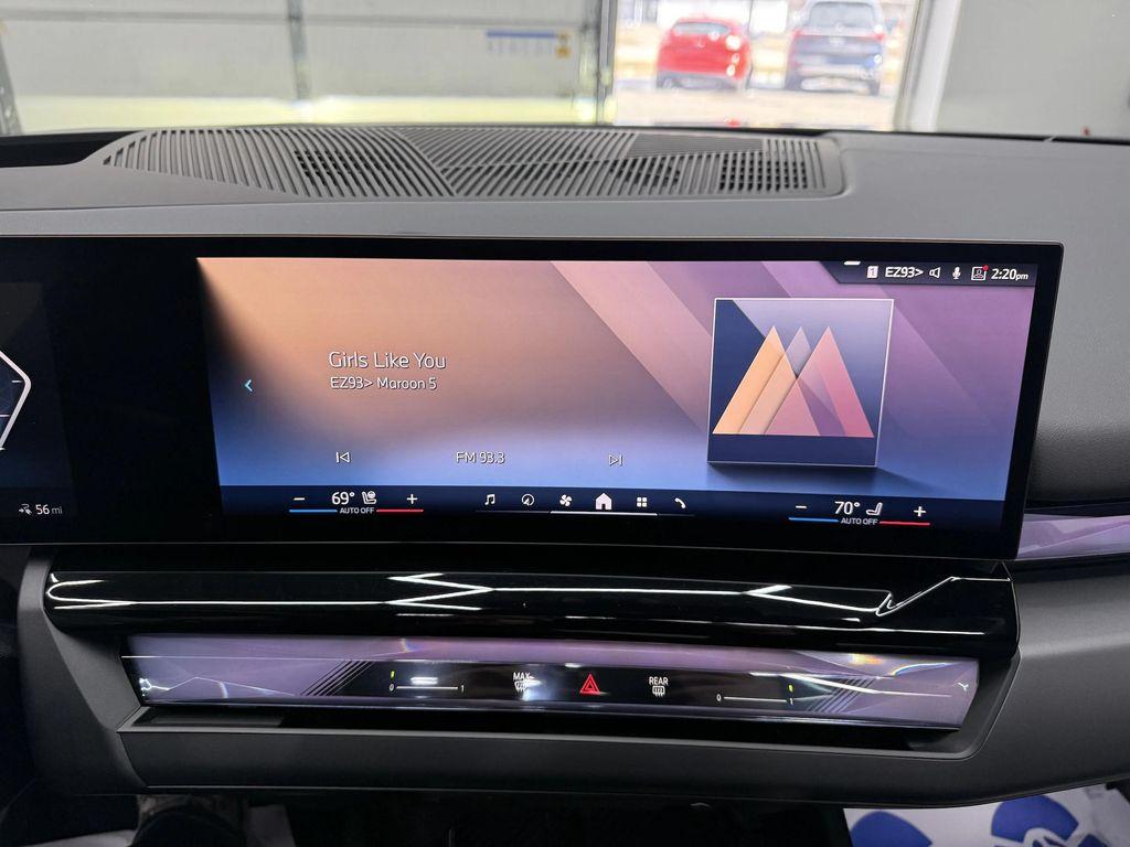 used 2024 BMW i5 car, priced at $44,900