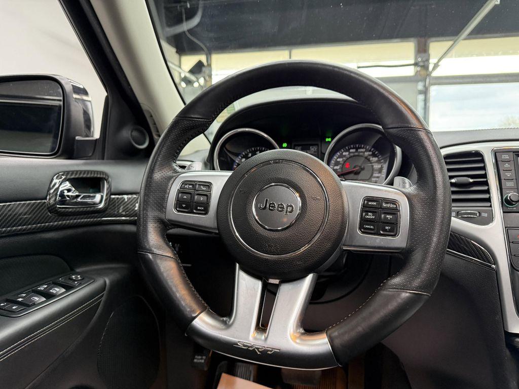 used 2013 Jeep Grand Cherokee car, priced at $23,900