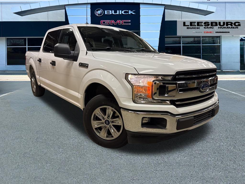 used 2018 Ford F-150 car, priced at $14,843