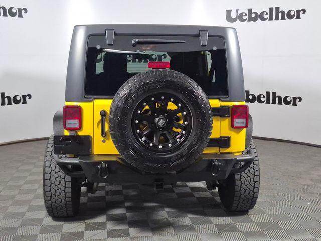 used 2015 Jeep Wrangler Unlimited car, priced at $18,915