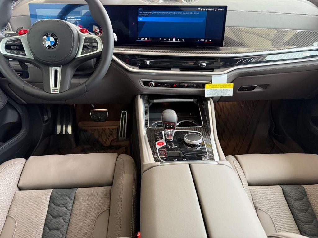 new 2025 BMW X6 M car, priced at $148,044