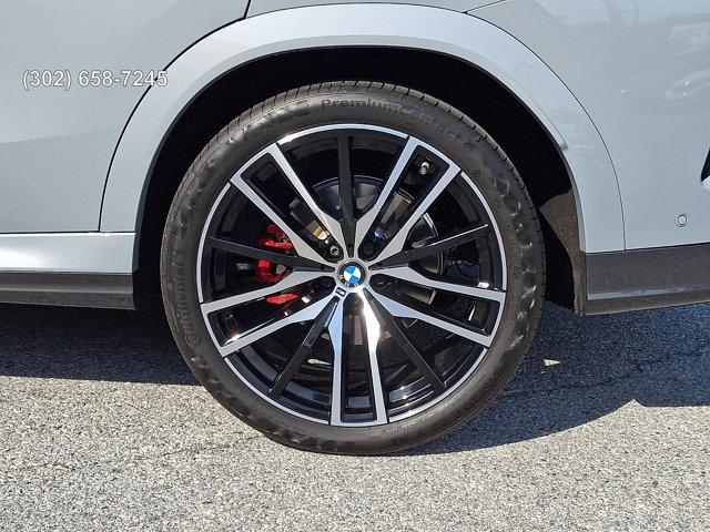 used 2025 BMW X6 car, priced at $74,559