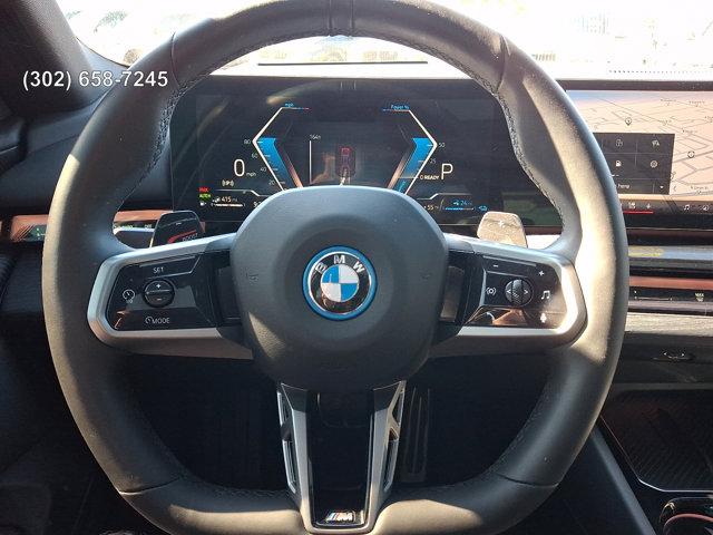 used 2025 BMW 550e car, priced at $63,488