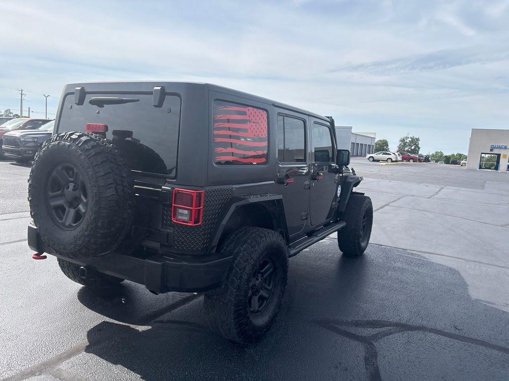 used 2018 Jeep Wrangler JK Unlimited car, priced at $23,996