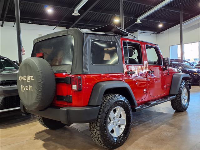 used 2014 Jeep Wrangler Unlimited car, priced at $9,900