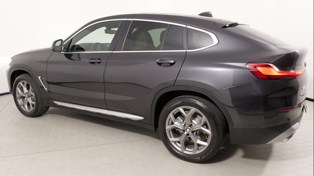 used 2025 BMW X4 car, priced at $48,999