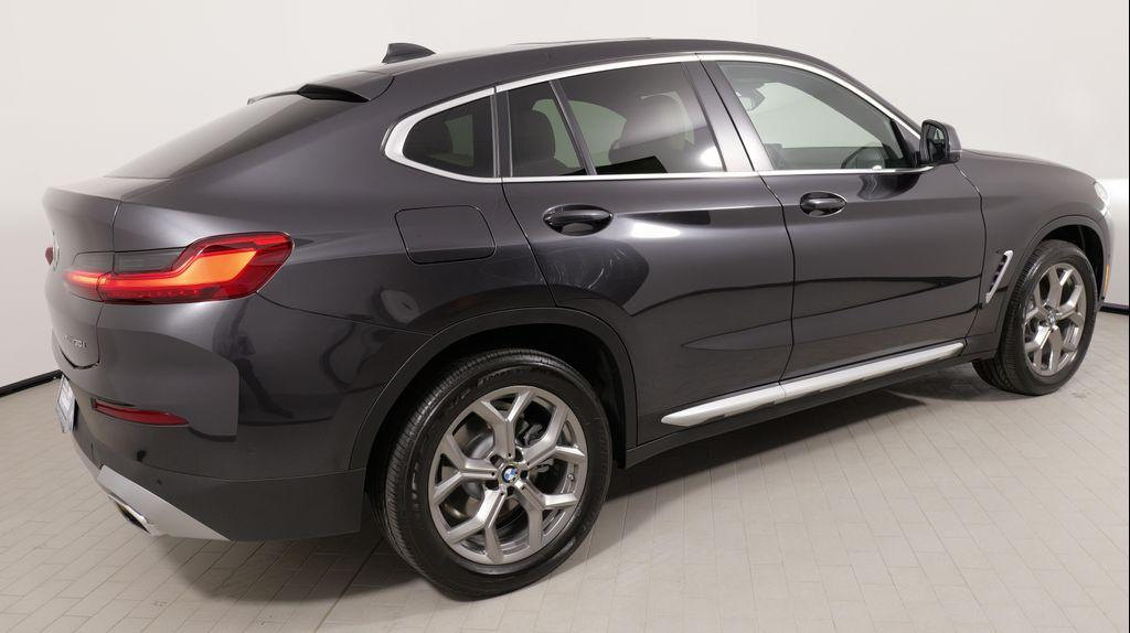 used 2025 BMW X4 car, priced at $48,999