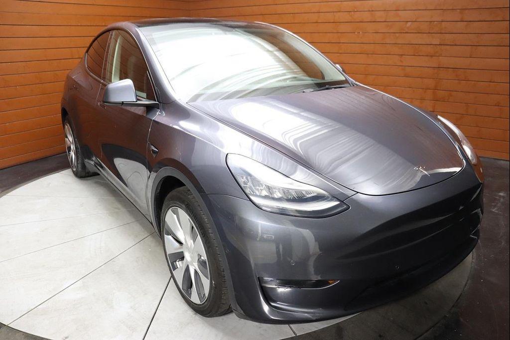 used 2023 Tesla Model Y car, priced at $33,290