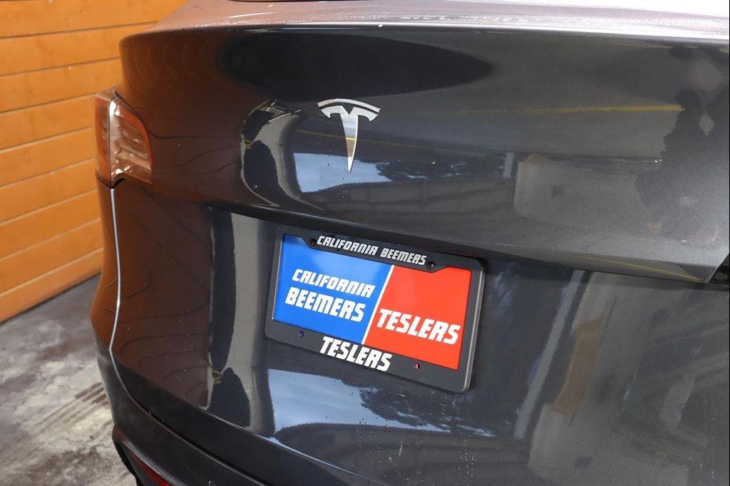 used 2023 Tesla Model Y car, priced at $33,290