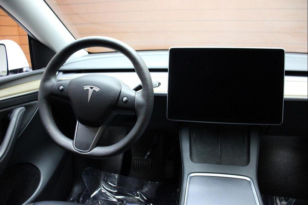 used 2023 Tesla Model Y car, priced at $30,290