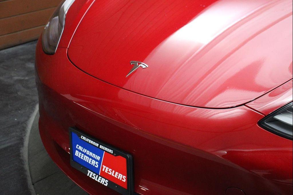 used 2023 Tesla Model 3 car, priced at $25,190