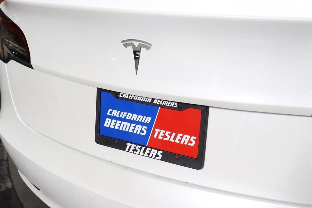used 2023 Tesla Model 3 car, priced at $23,688