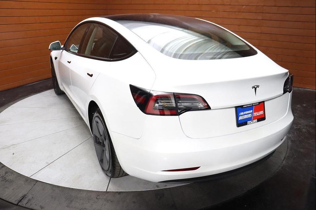 used 2023 Tesla Model 3 car, priced at $23,688