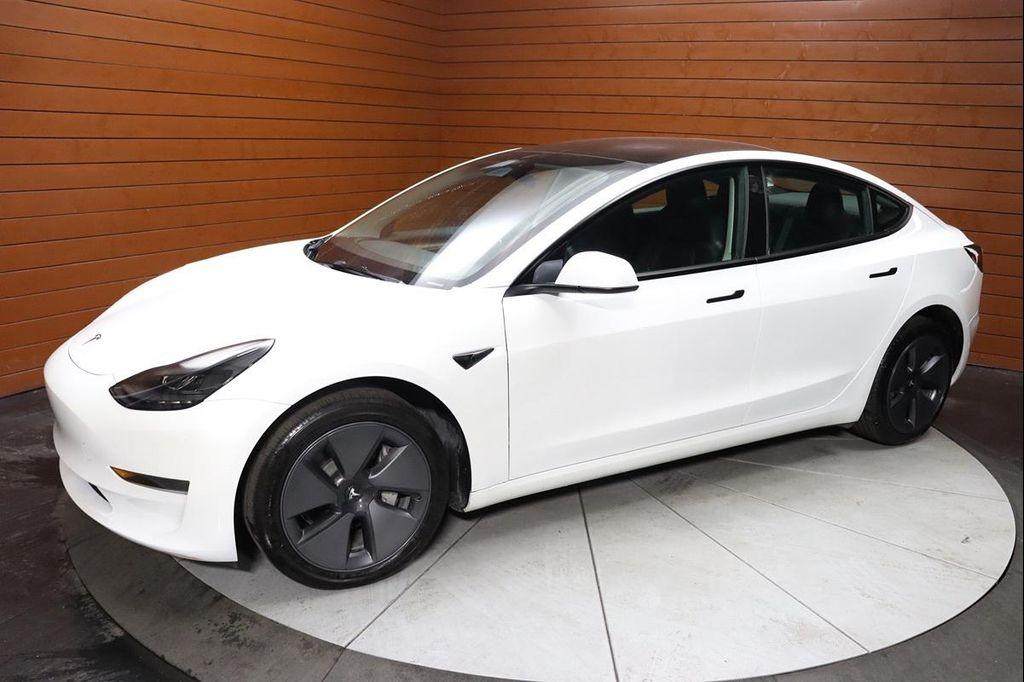 used 2023 Tesla Model 3 car, priced at $23,688