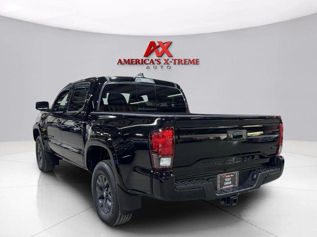 used 2023 Toyota Tacoma car, priced at $30,299