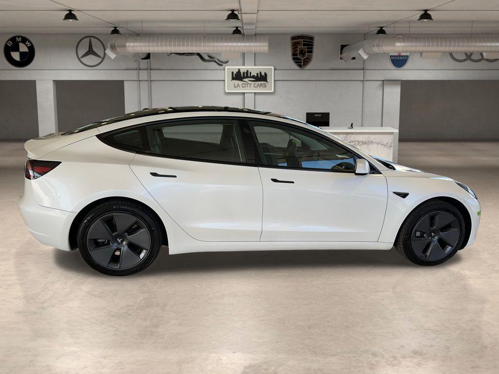 used 2023 Tesla Model 3 car, priced at $22,799