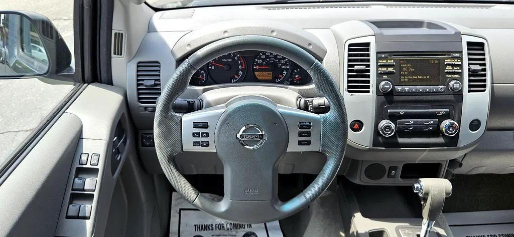 used 2014 Nissan Frontier car, priced at $17,580