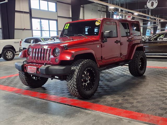 used 2012 Jeep Wrangler Unlimited car, priced at $14,988