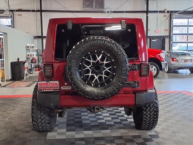 used 2012 Jeep Wrangler Unlimited car, priced at $14,988