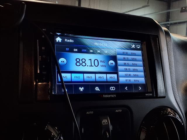 used 2012 Jeep Wrangler Unlimited car, priced at $14,988