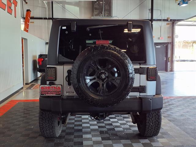used 2014 Jeep Wrangler Unlimited car, priced at $15,988