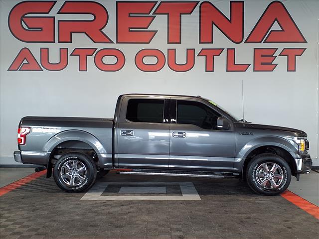 used 2018 Ford F-150 car, priced at $21,988