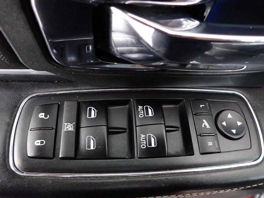 used 2018 Ram 1500 car, priced at $23,999