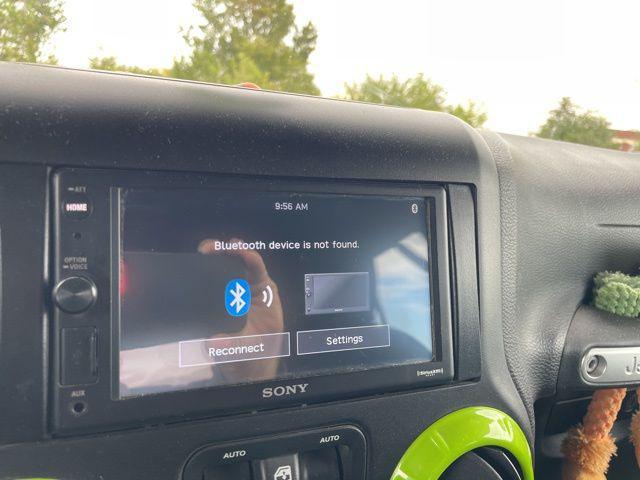 used 2016 Jeep Wrangler Unlimited car, priced at $18,305