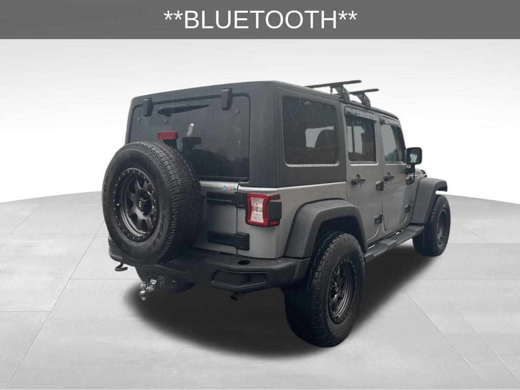 used 2014 Jeep Wrangler Unlimited car, priced at $16,999