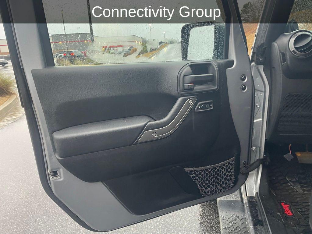 used 2014 Jeep Wrangler Unlimited car, priced at $16,999