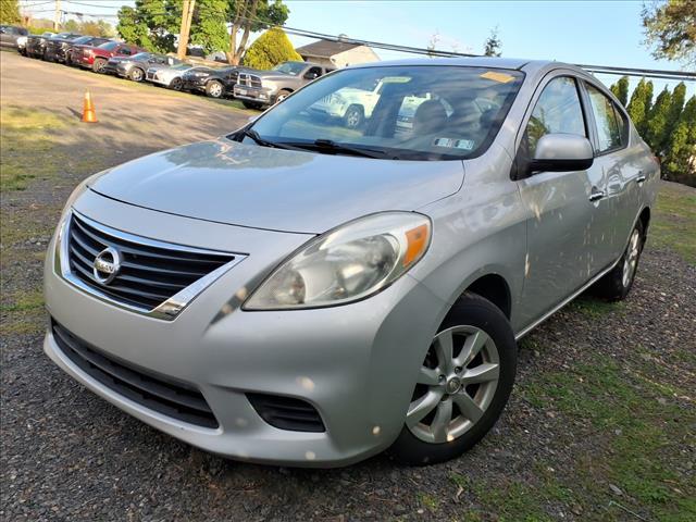 used 2014 Nissan Versa car, priced at $7,000