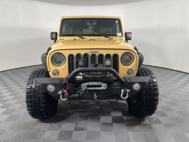 used 2014 Jeep Wrangler Unlimited car, priced at $18,868