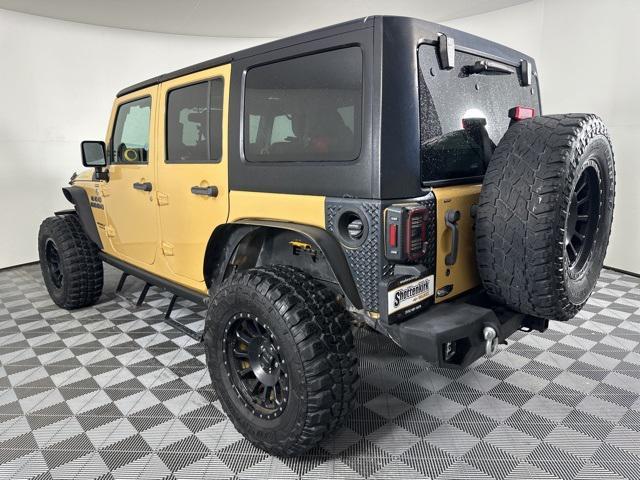 used 2014 Jeep Wrangler Unlimited car, priced at $18,868