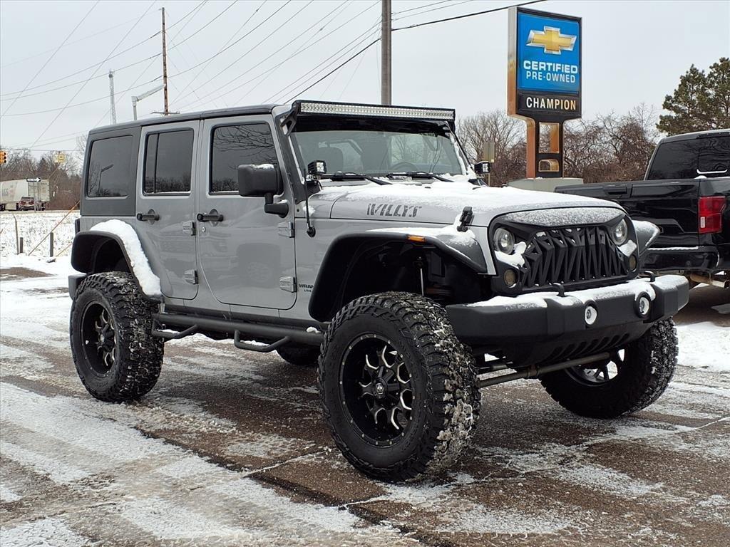 used 2014 Jeep Wrangler Unlimited car, priced at $15,750