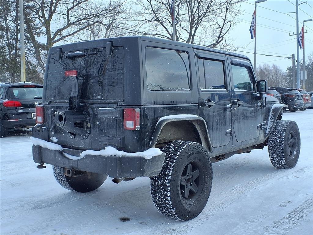 used 2013 Jeep Wrangler Unlimited car, priced at $9,950
