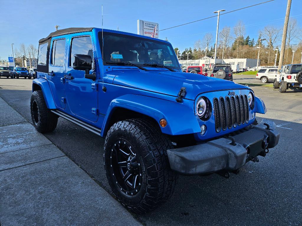 used 2015 Jeep Wrangler Unlimited car, priced at $19,576