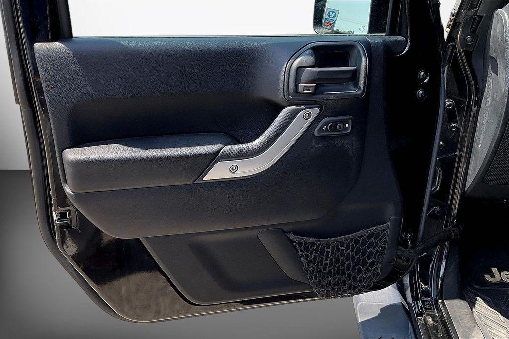 used 2016 Jeep Wrangler Unlimited car, priced at $25,054