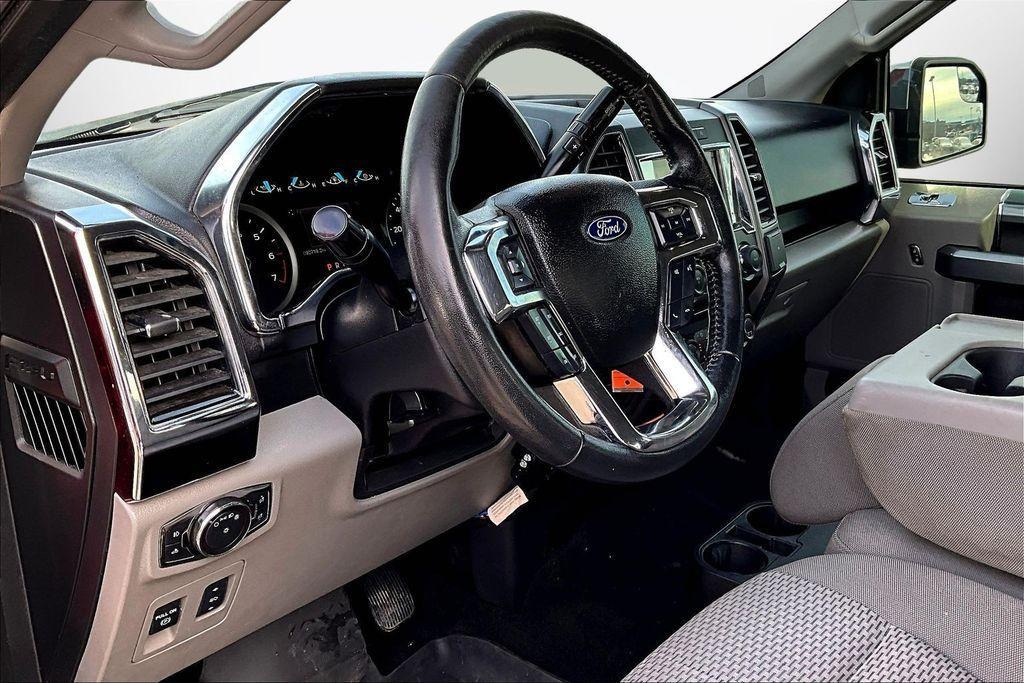 used 2018 Ford F-150 car, priced at $22,560